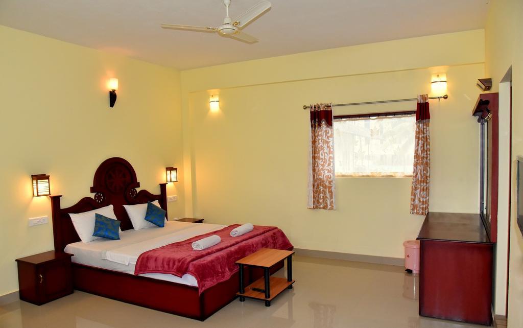 Jungle Palace Homestay เทกคาดี ห้อง รูปภาพ